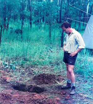 Tony O'Grady looking at hole